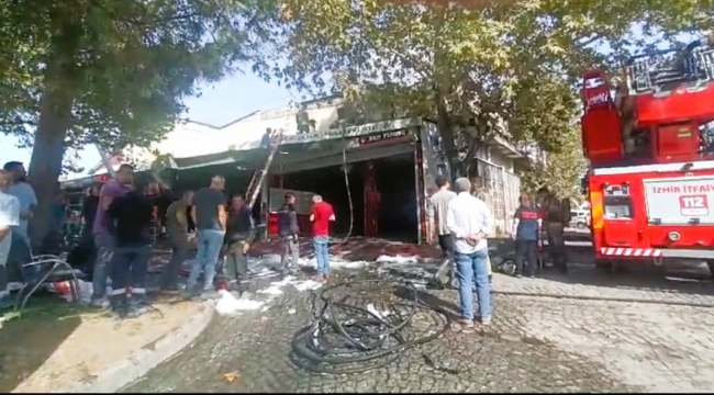 Bergama'da oto aksesuar dükkanında çıkan yangında faciadan dönüldü